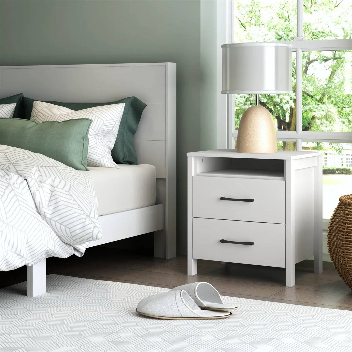 Modern 2-Drawer Bedside Table Nightstand in White Wood Finish next to a bed with decor accents in a contemporary bedroom setup.