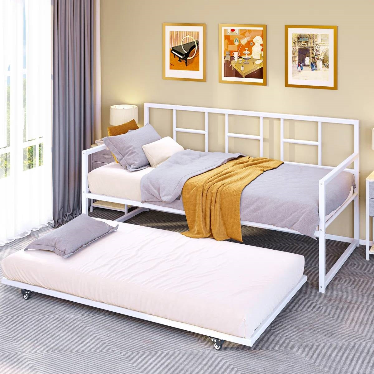 Twin size White Metal Daybed Frame with Roll Out Trundle Bed Frame in modern room setting