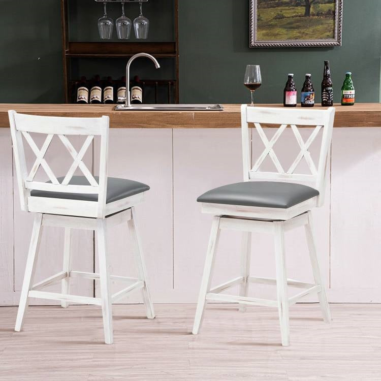 Set of 2 White Wood 24-in Counter Height Farmhouse Swivel Cushion Seat Barstools in a kitchen setting