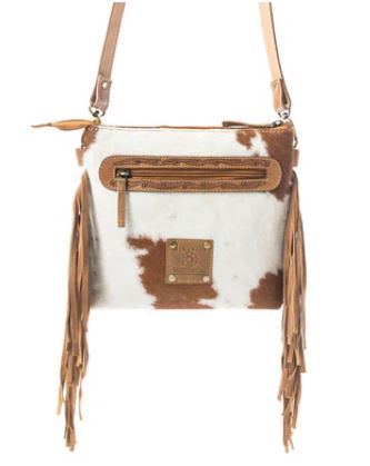 Western Meadows Brown Hair-on Cowhide Crossbody Bag with fringe, tooled leather, and antique brass hardware