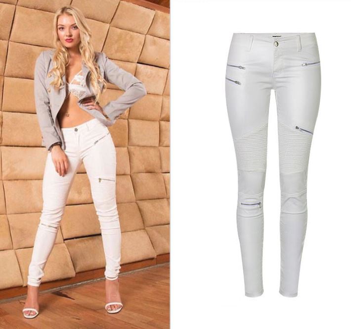 Woman wearing "Lola" White Faux Leather Zippered Knee Pencil Pants, showcasing stylish low-waist fit with embroidered details