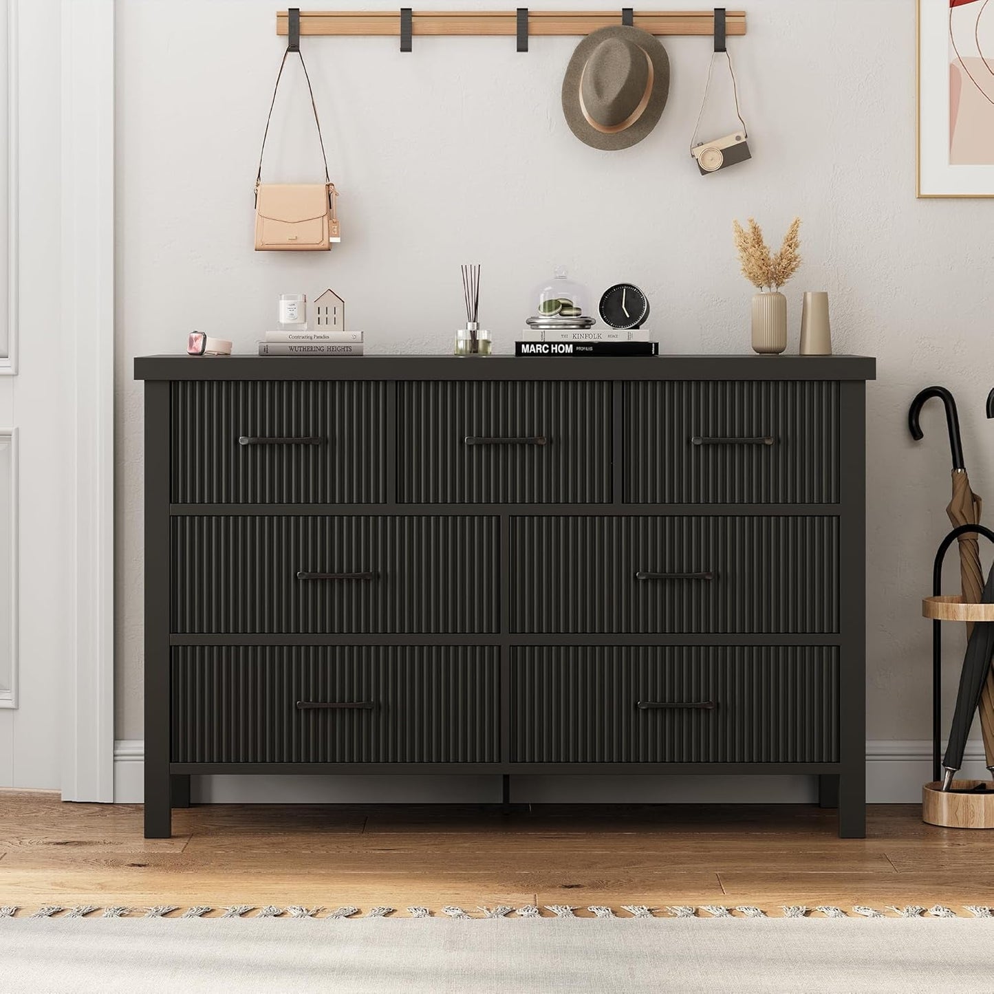 Fluted Contemporary White Dresser With Black Handles in a stylish room setting.