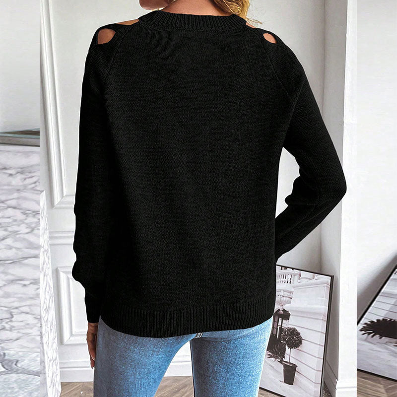 Back view of woman wearing Women's Casual Long Sleeve Hollow Out Sweater in black with unique openwork design.
