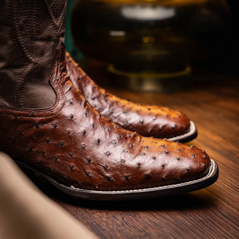 Alabama Kango Tabac genuine ostrich skin cowboy boots from the Western Collection on display
