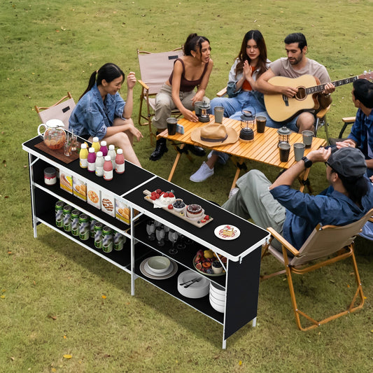 Aluminum Portable Picnic Table with 2-Tier Open Shelves and Spacious Tabletop-Black in use during outdoor gathering with friends.