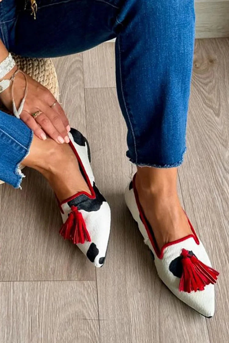 Cow Print Tassel Pumps Women | Casual Slip-On Style featuring cow-pattern upper and decorative tassels perfect for any casual outing.