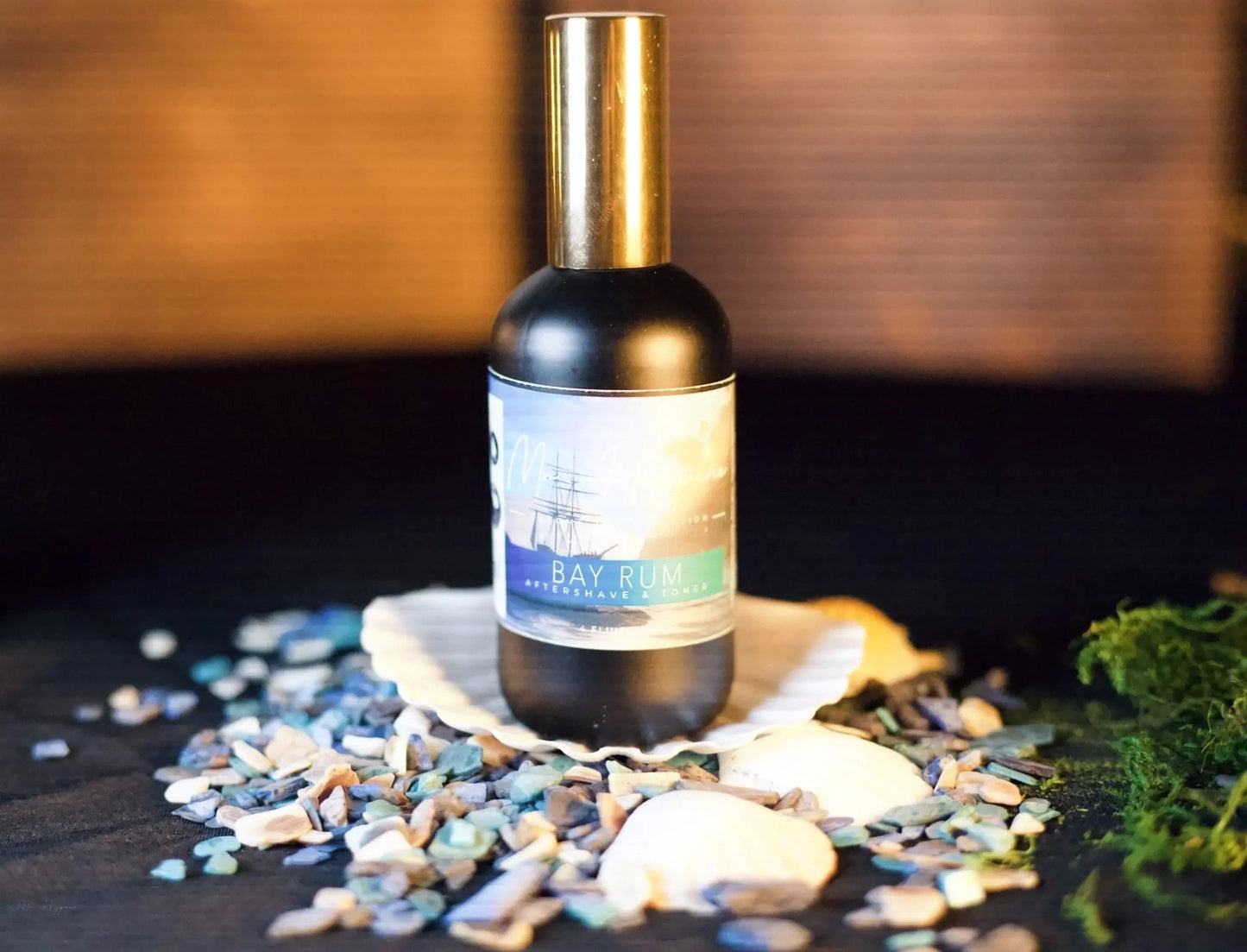 Bay Rum Aftershave bottle on sea-themed backdrop