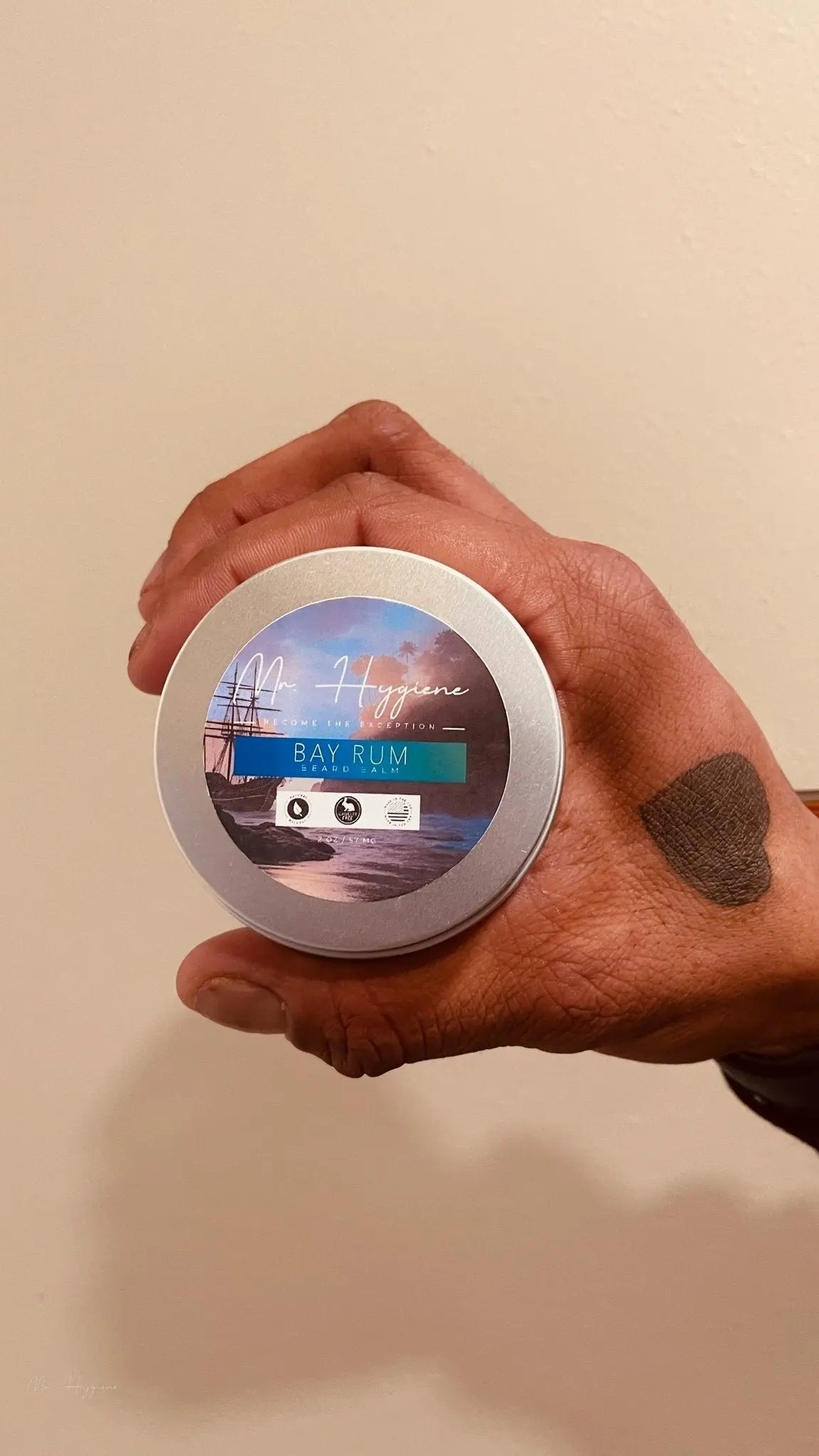Hand holding Bay Rum Beard Balm – Bold Scent & Daily Control tin, ideal for nourishing and styling beards.