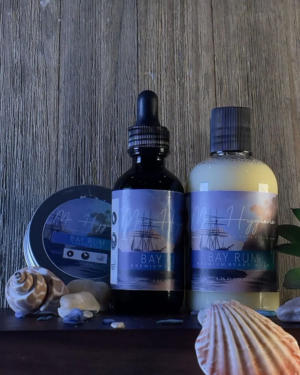 Bay Rum Mens Beard Kit – Bold Scent, Full Grooming Set displayed with seashells.
