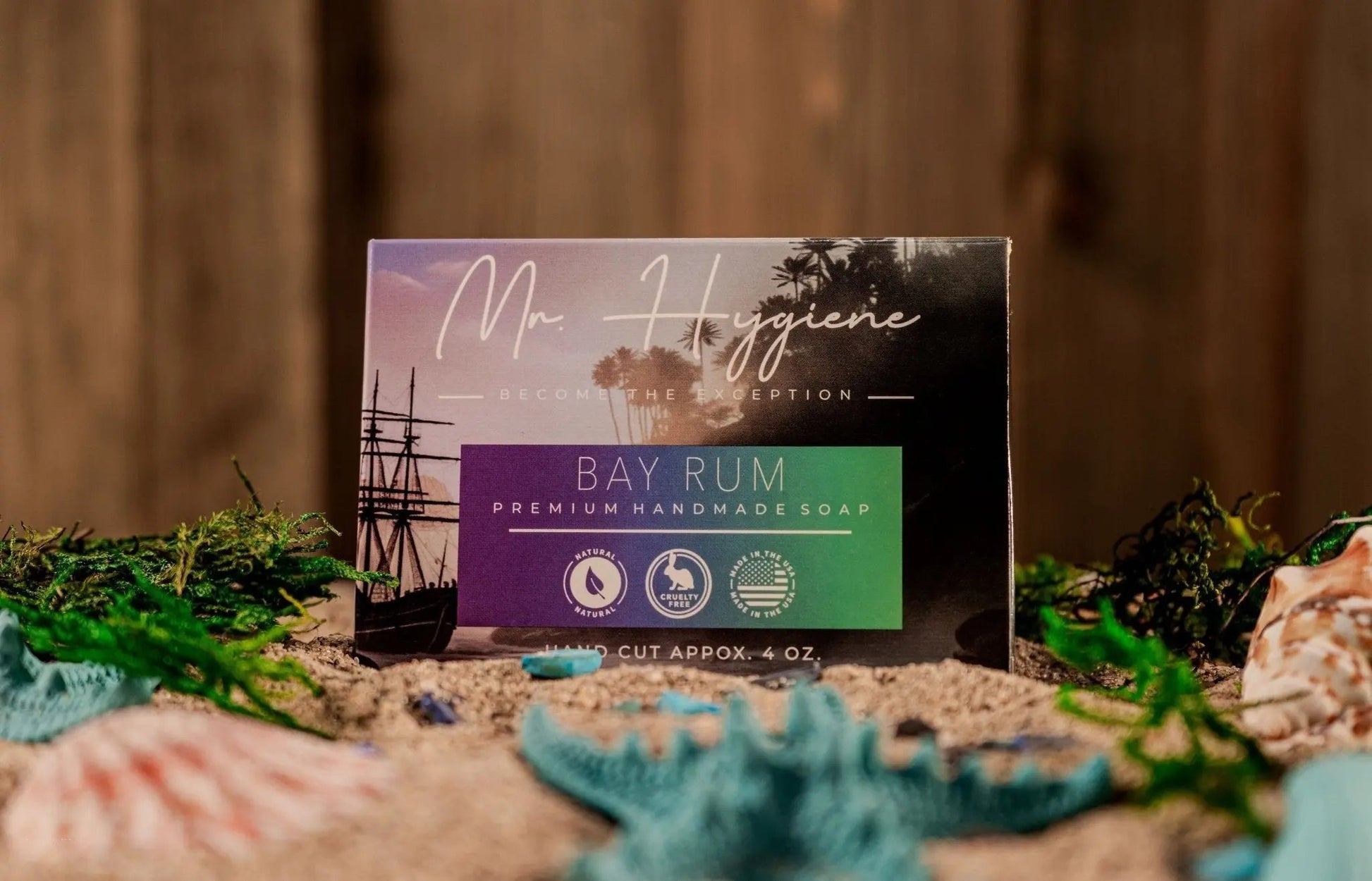 Bay Rum Mens Soap – Classic Scent, Modern Clean packaging on sandy background with seashells and greenery