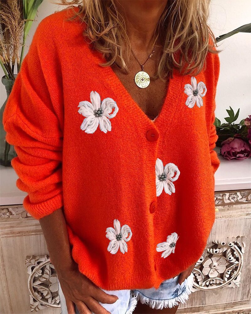 Women’s V Neck Crochet Cardigan in vibrant orange with floral embroidery and loose fit.