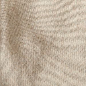 Close-up of beige cashmere blend fabric texture from Cashmere Blend Quarter Zip sweater.