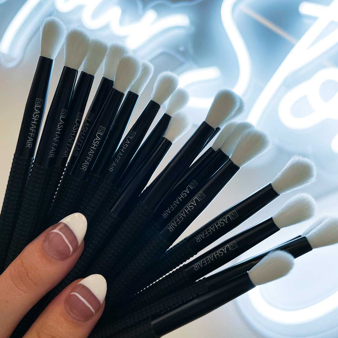 Magnetic Lash Cleansing Brush - 20 Pack with soft bristles for eyelash extensions and natural lashes, set against a stylish background.