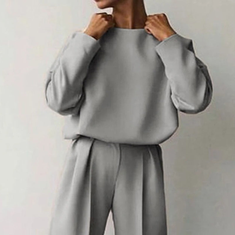 Women’s Solid Color 2-Piece Set – Long Sleeve Top & Pleated Pants Loungewear in gray, featuring a soft round-neck top and wide-leg pants.