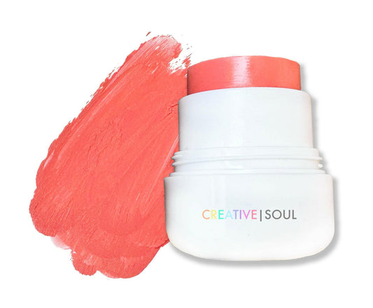 Crazy Coral cream blush in soft coral peach, vegan, cruelty-free, blendable, highly pigmented with satin-matte finish.