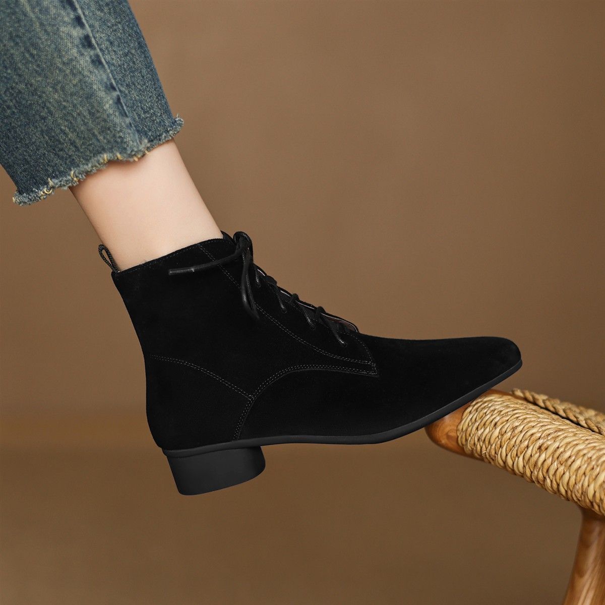 Wearing Maillard Matte Pointed Low-Heel Ankle Boots Women in black, ideal for versatile styling.
