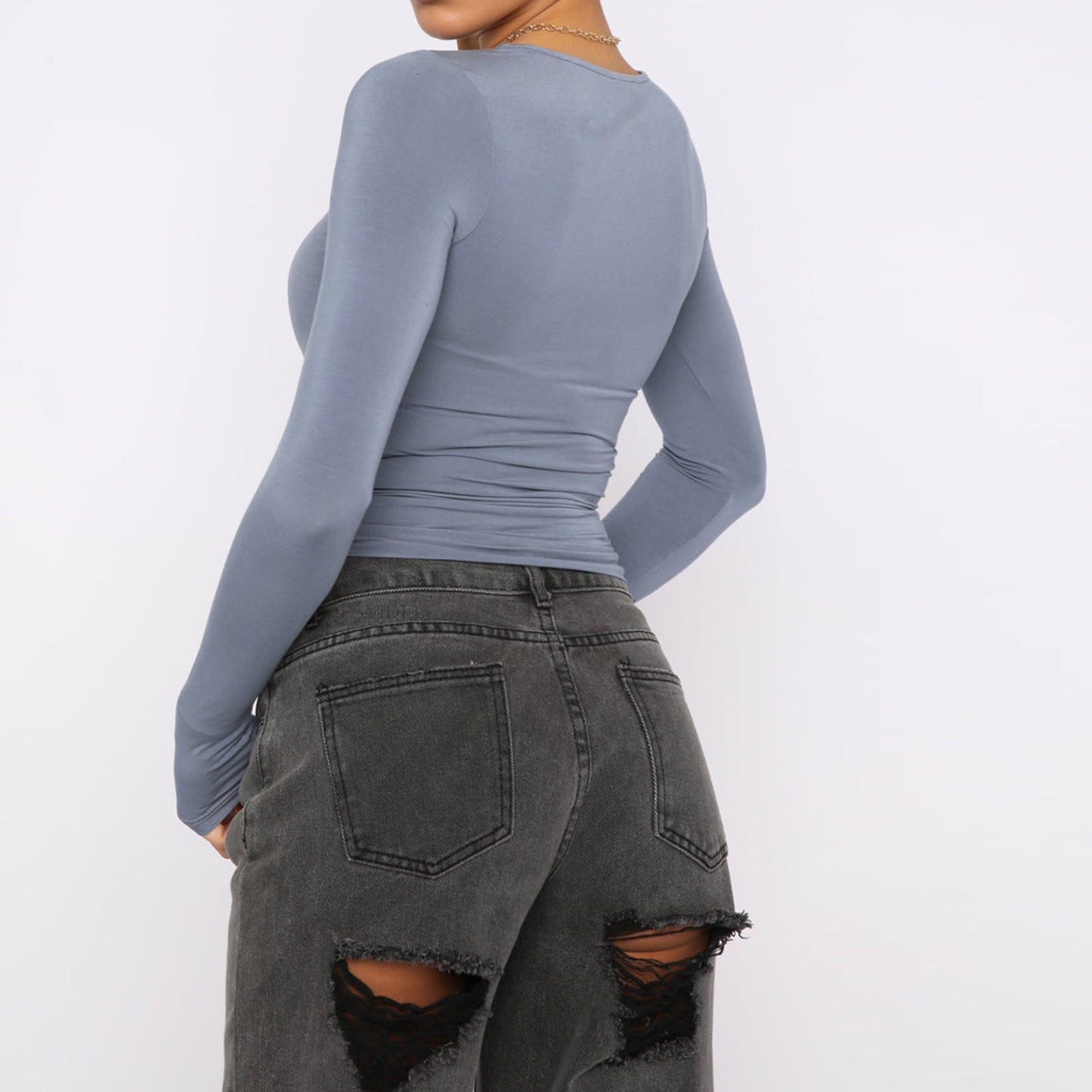 Back view of Slim Fit Long Sleeve Shirt | Women's Casual Crop Tops in blue, paired with black distressed jeans.