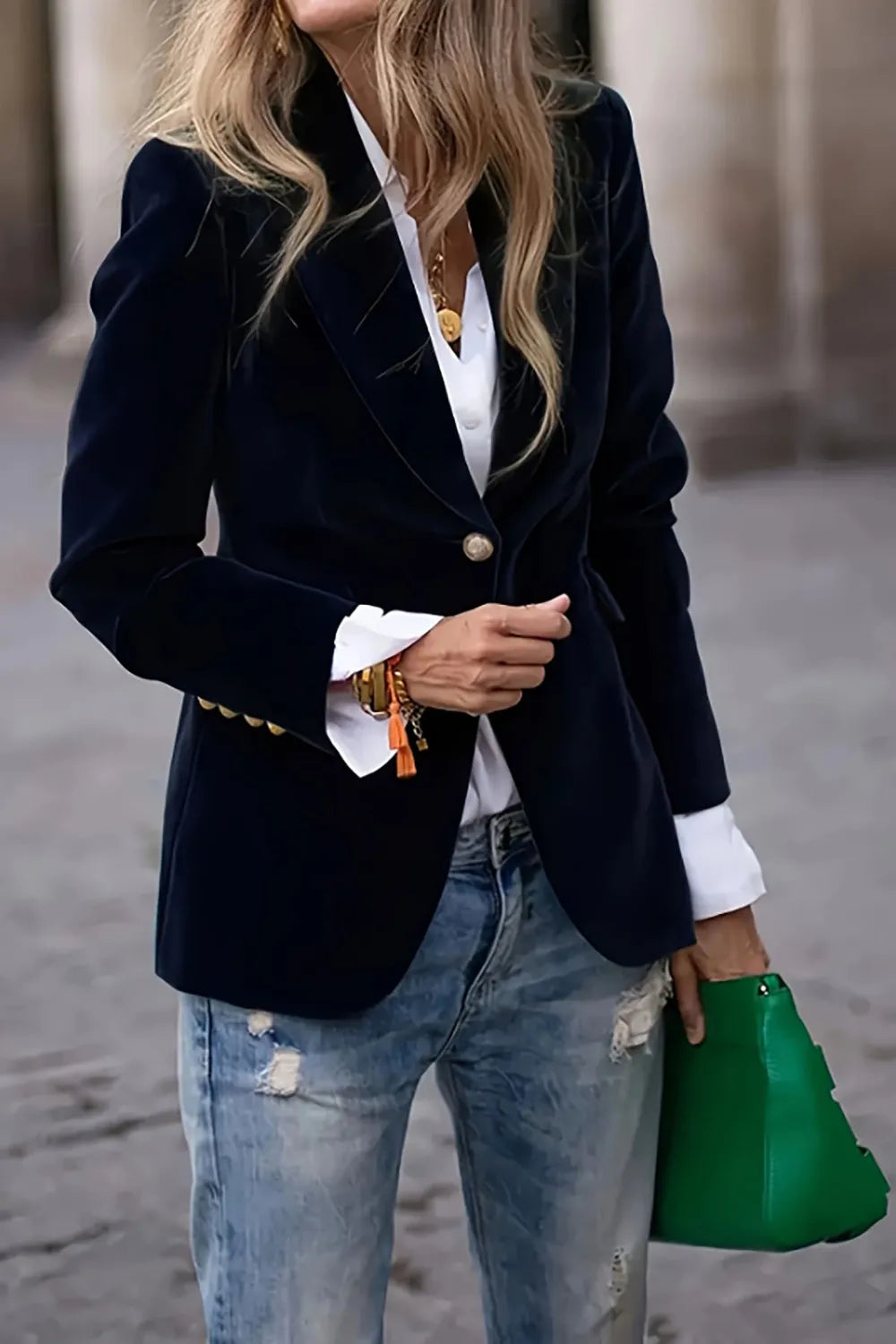 One-Button Lapel Collar Long Sleeve Blazer for Women styled with casual jeans and a vibrant green handbag.