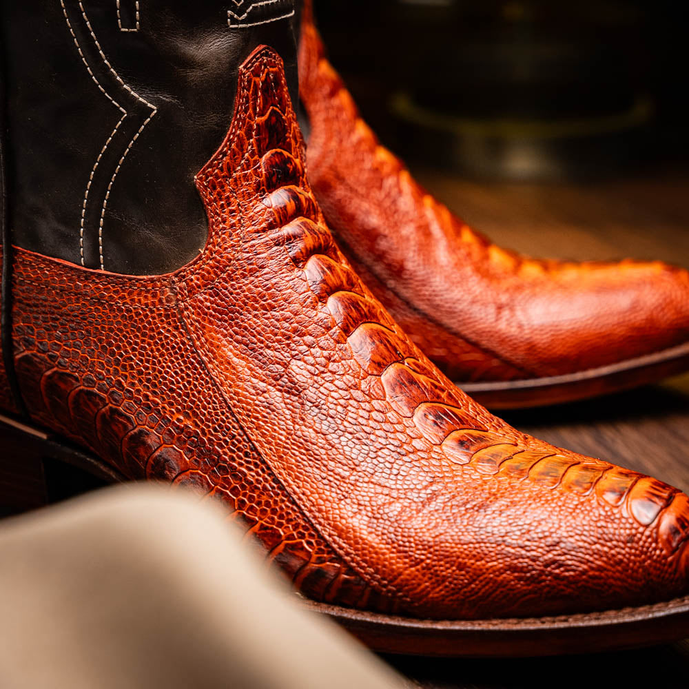 Denver Rustic Cognac ostrich leg skin cowboy boot with detailed red and black design, from the Western Collection.