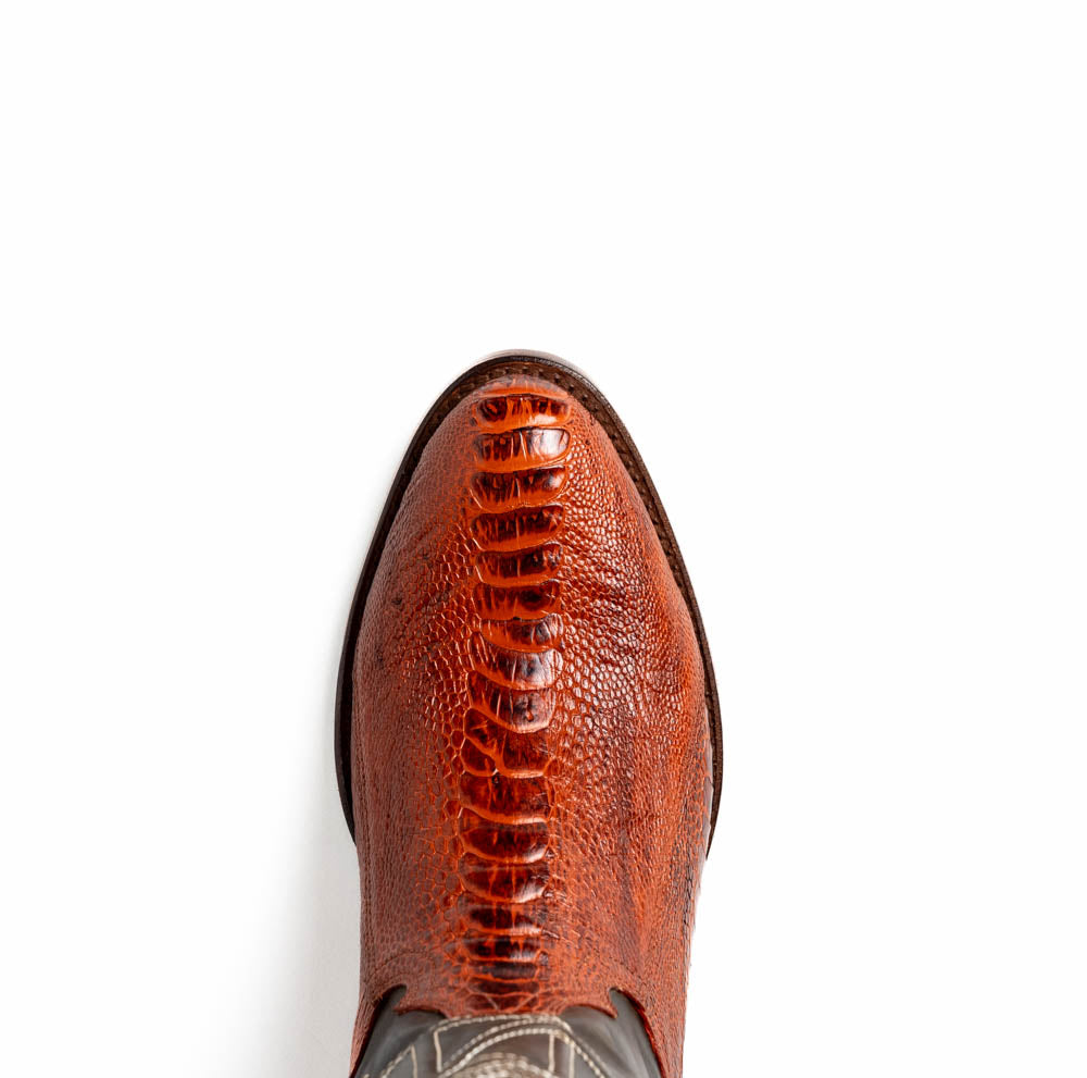 Denver Rustic Cognac cowboy boot in genuine ostrich leather, showcasing natural ridges and grain in deep red color.