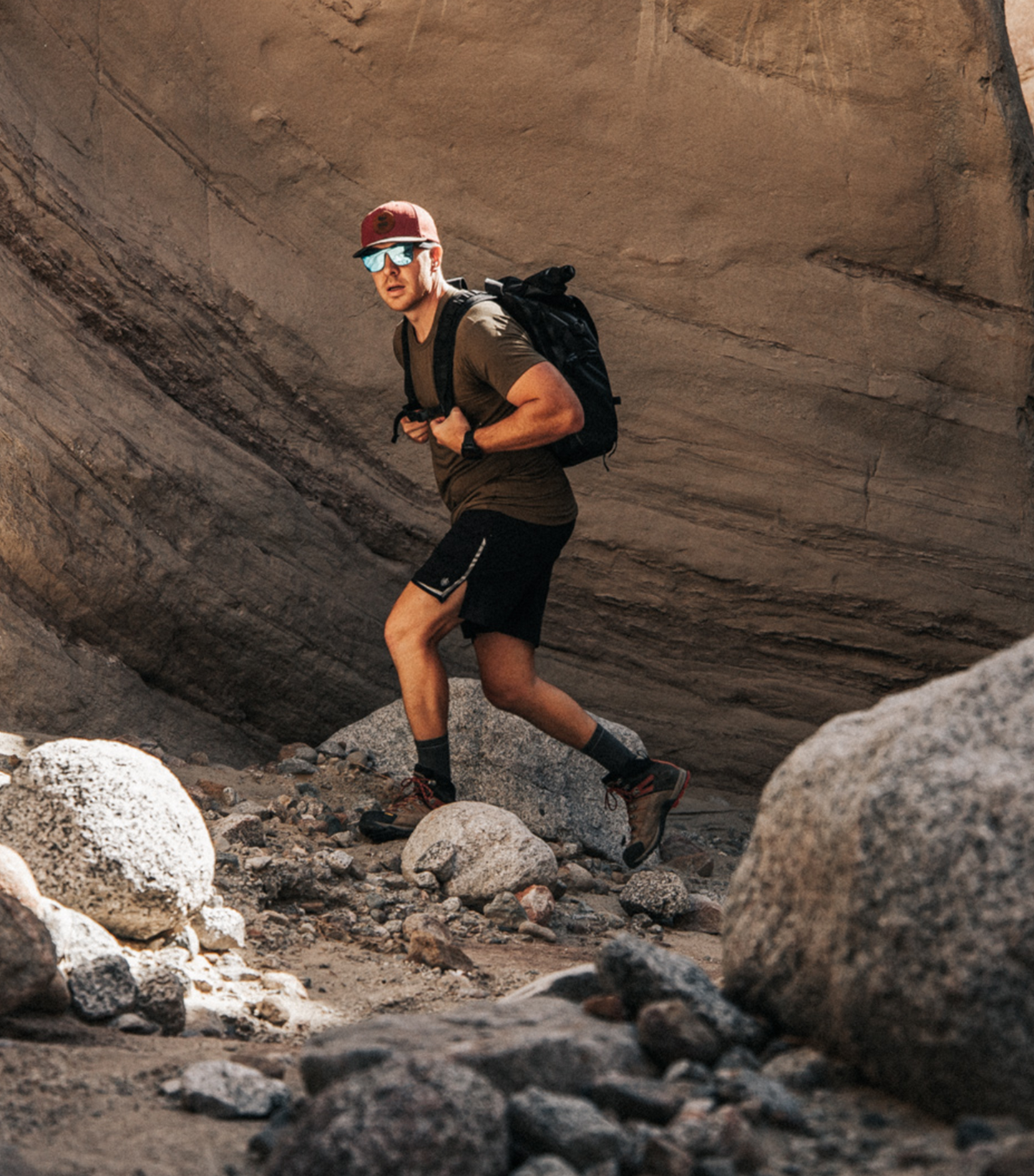Athlete in action wearing Dominate Training Shorts Black outdoor training session