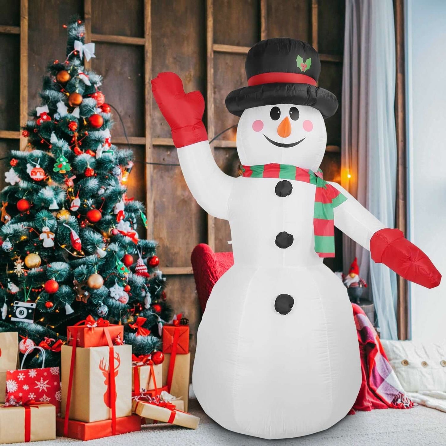 Christmas Inflatable Giant Snowman standing beside decorated tree indoors, 7.9FT tall with black hat and colorful scarf.