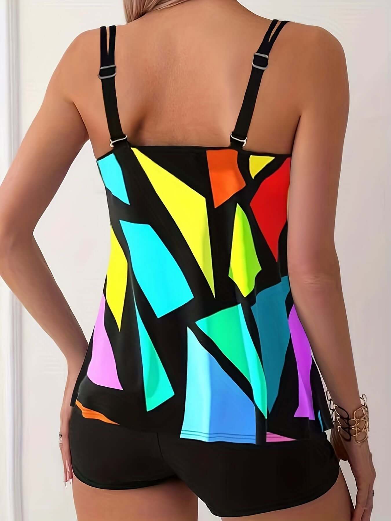 Back view of The Tabby Spot Geometric Pattern Multicolored Tankini Set with round neck and boxer shorts. Women's swimsuit.