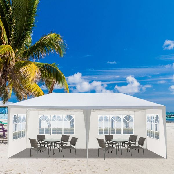 10'X20' white outdoor party tent, waterproof canopy with 4 removable sidewalls on a sunny beach, ideal for weddings and events.