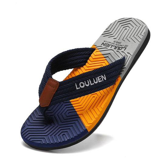Colorful men's flip flops with lightweight rubber sole, perfect for beach vacations and casual wear. Comfortable strap and versatile design.