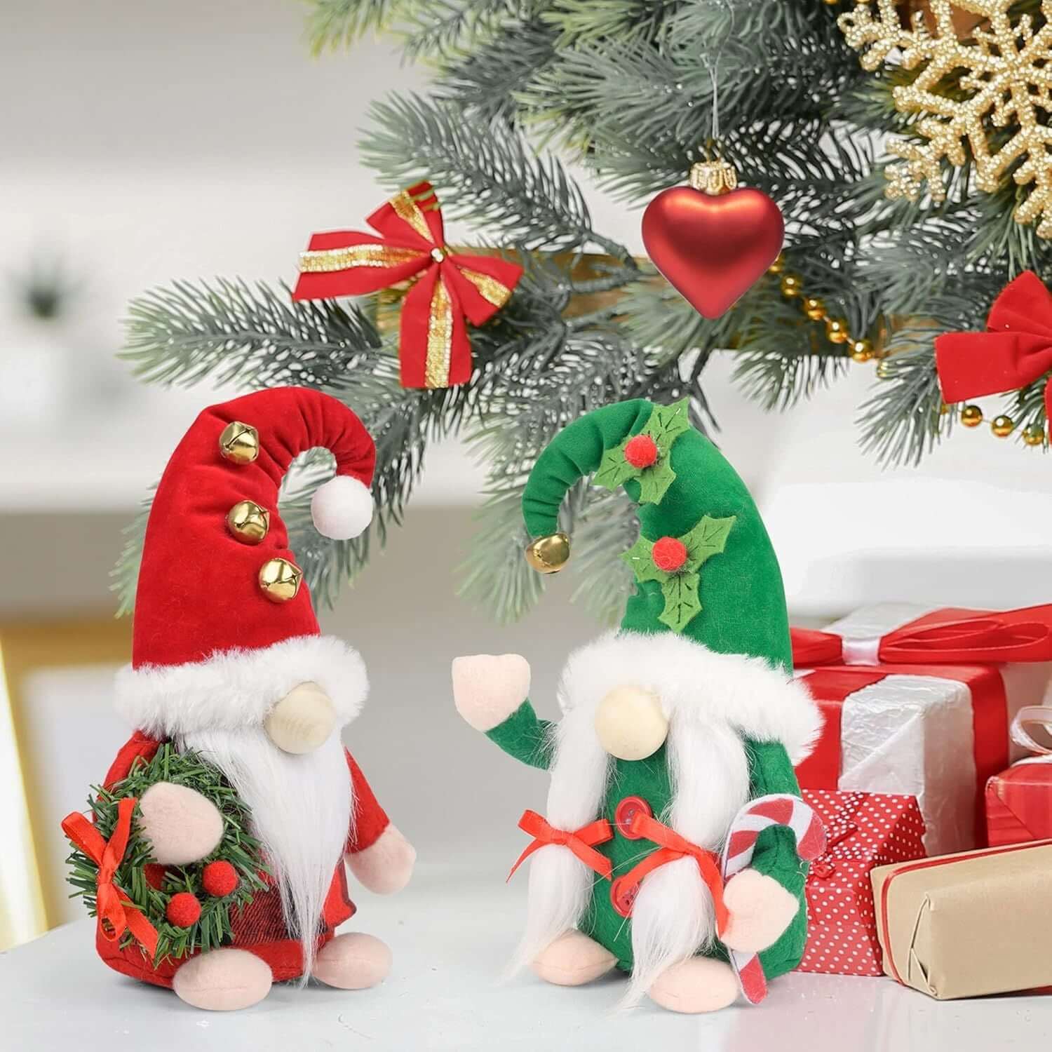 Christmas Gnomes Plush - 2 handmade Swedish gnome figurines under a decorated tree with gifts, adding festive charm to your home.