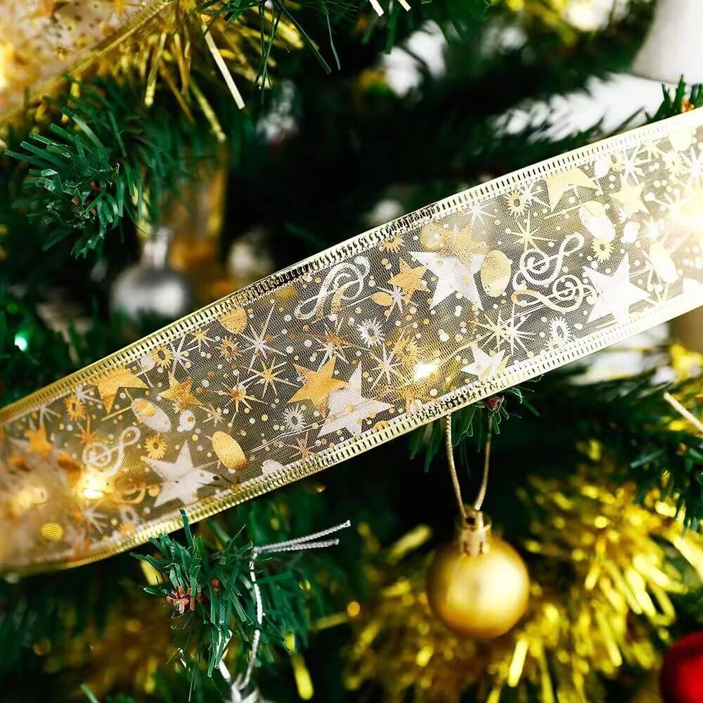 Christmas Glowing Ribbon Led Light String wrapped around a Christmas tree branch, featuring decorative gold and star patterns for festive decor.