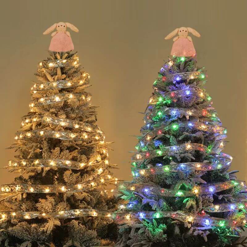 Two Christmas trees decorated with Christmas Glowing Ribbon Led Light String, one with warm white lights and the other with colorful lights.
