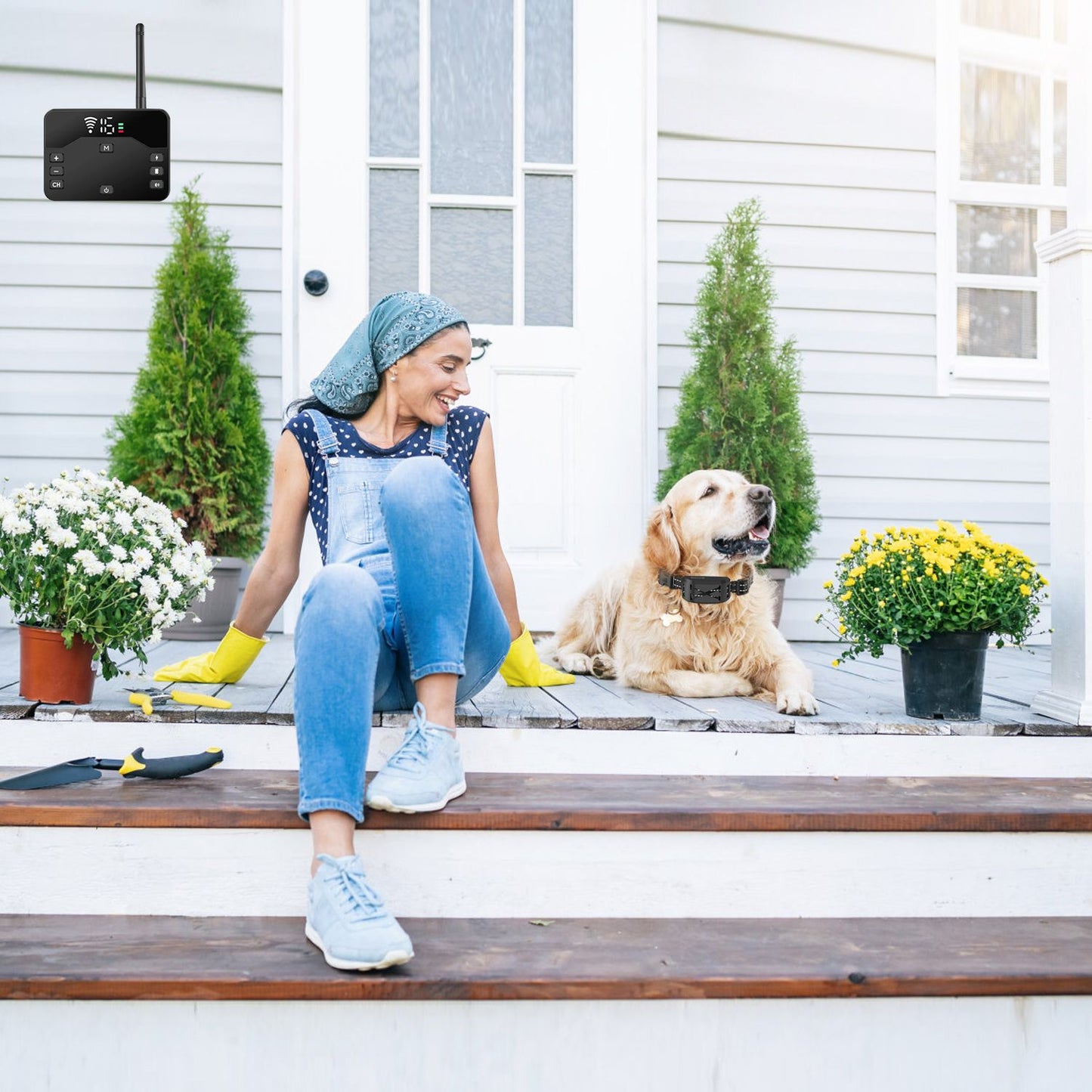 Woman with golden retriever wearing waterproof electric fence collar on porch; wireless pet containment system visible.
