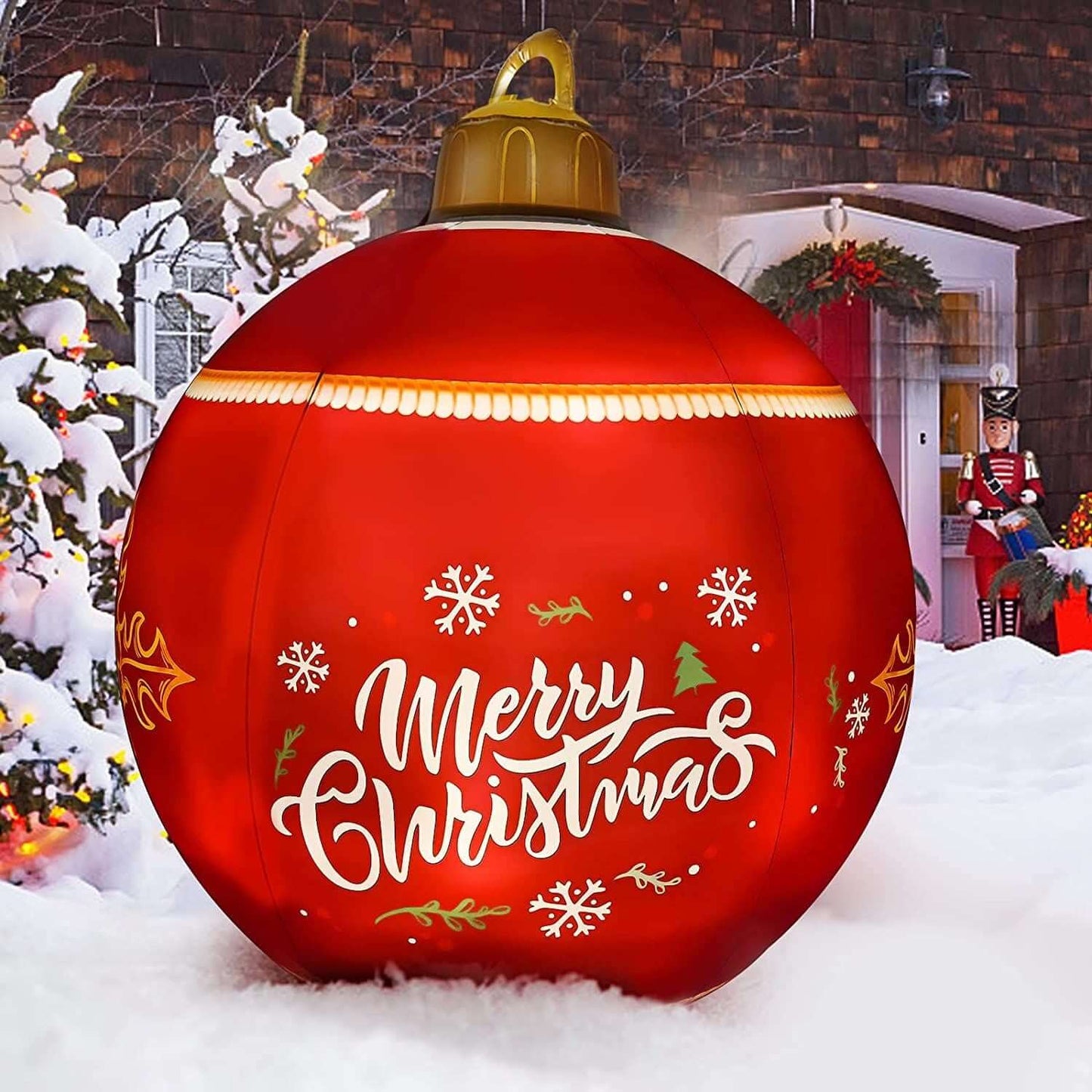 Inflatable Christmas Ball - 24 Inch red decoration with RGB colors in a snowy yard, perfect for outdoor holiday decor.