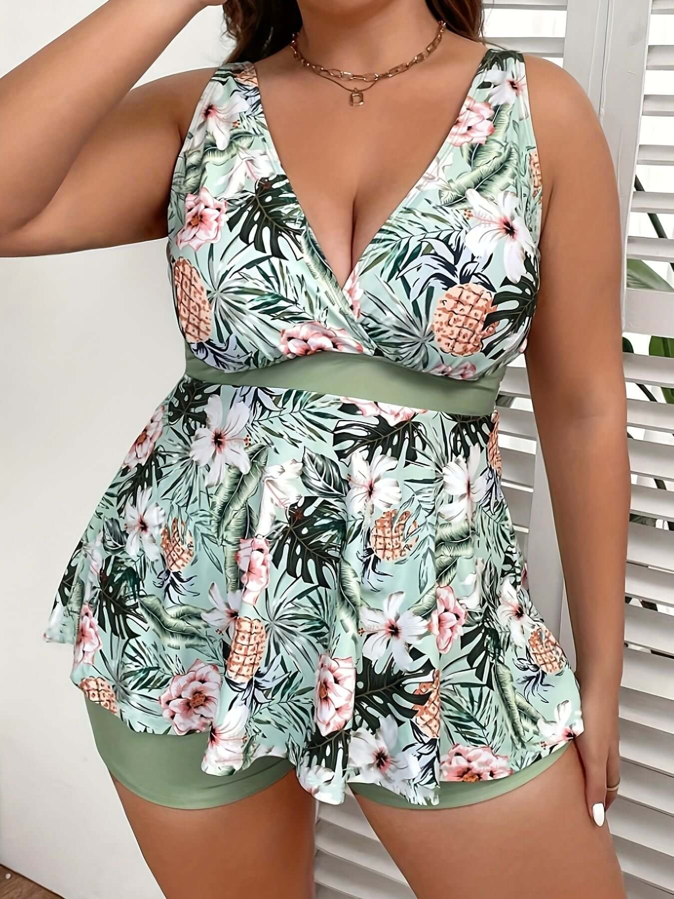 Large green women's Tankini swimsuit with floral print, quick-dry, high elasticity, from The Tabby Spot. Elegant style and gathered chest.