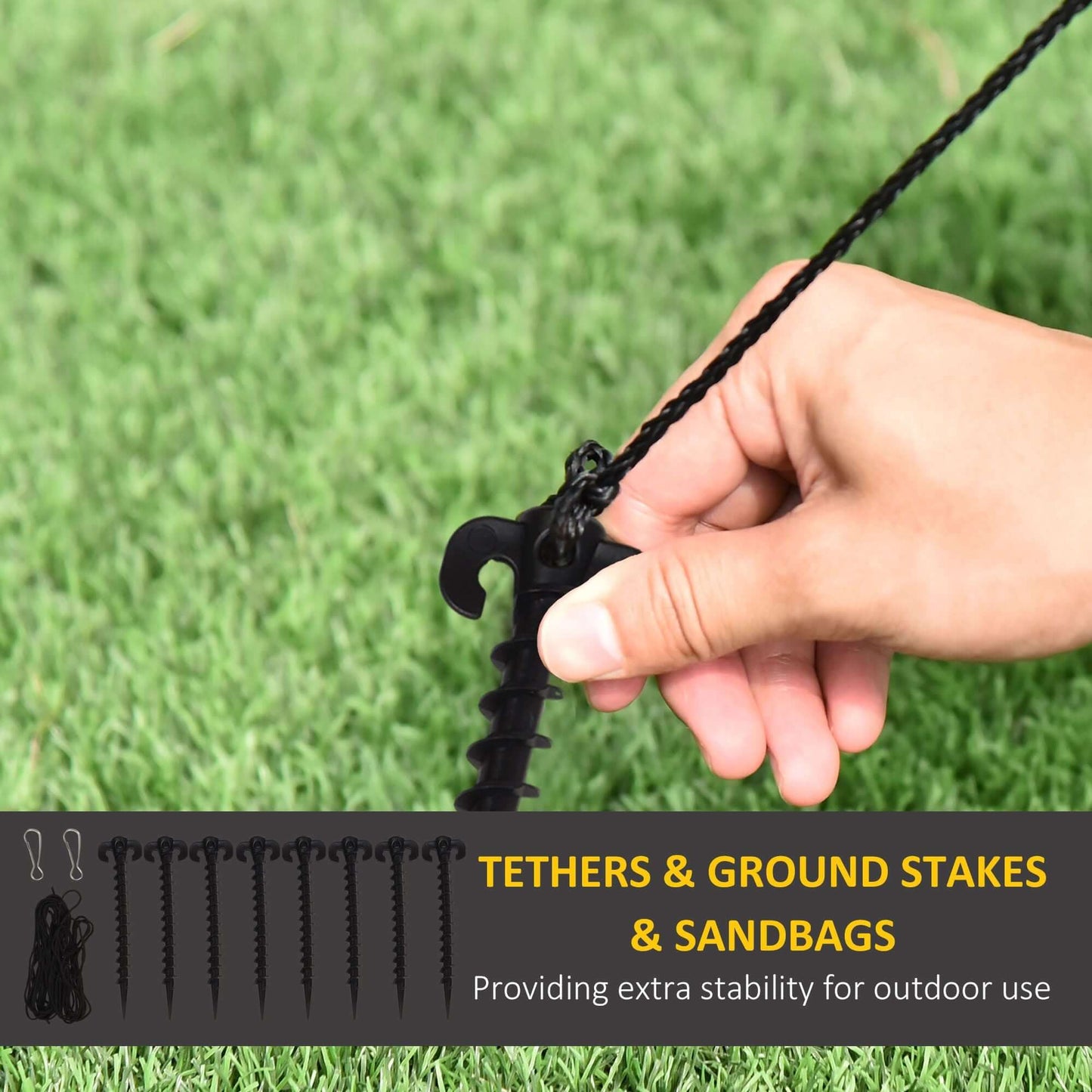 Hand securing ground stake for Inflatable Snowman stability outdoors