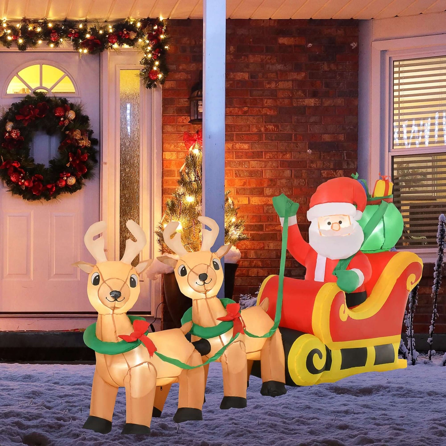 Christmas Inflatable Santa Claus with Sleigh, 8ft LED decoration in snowy yard, bringing festive holiday cheer with reindeer.