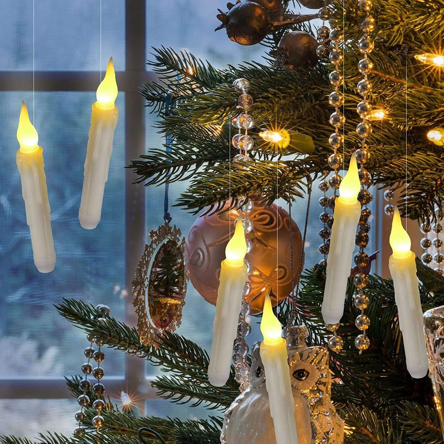 Floating LED Candles Remote Control Flameless on Christmas tree creating magical ambiance for holidays and parties.