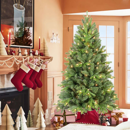 4 FT Christmas Tree with LED Lights featuring 527 tips in a festive living room setting, enhancing holiday decor with a realistic appearance.