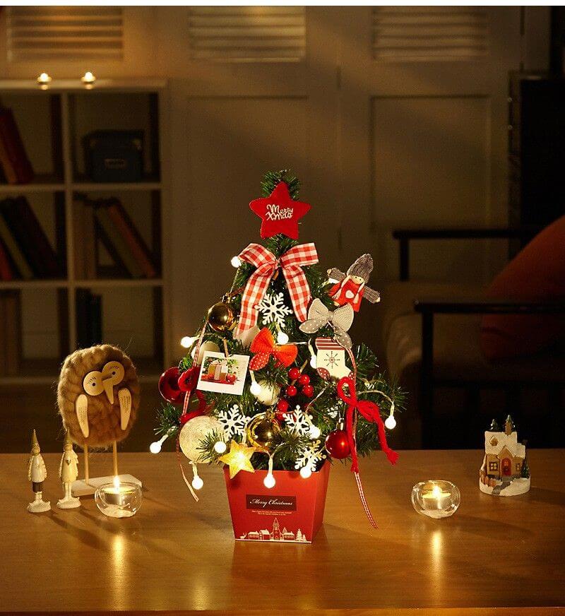 Cozy room with a decorated Desktop Christmas Tree, perfect for adding festive cheer to any table or desk.