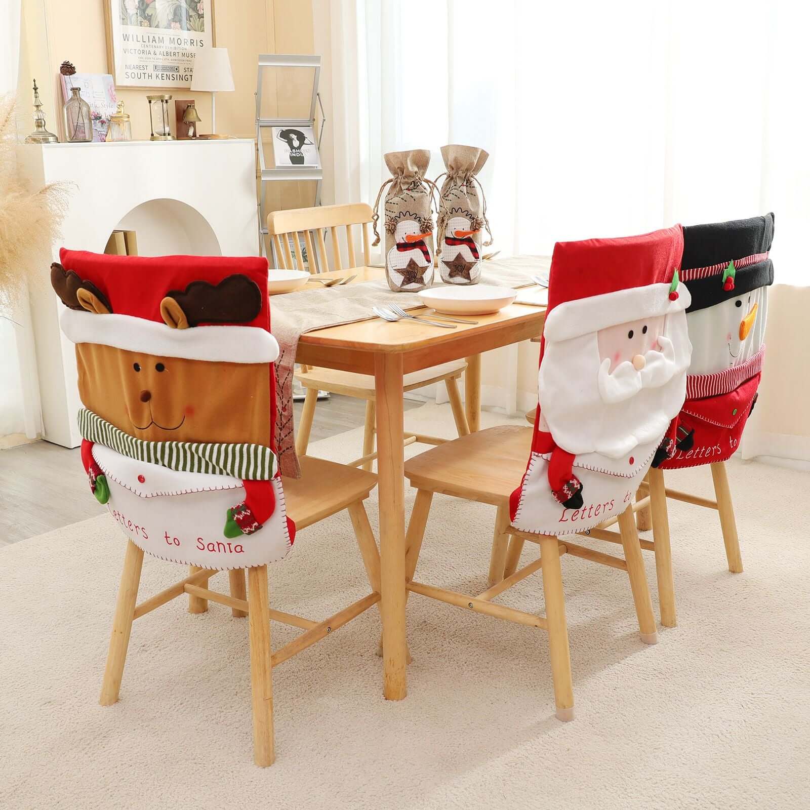 Christmas Snowman Chair Cover featuring holiday-themed envelope style decor on dining chairs in festive room setting.