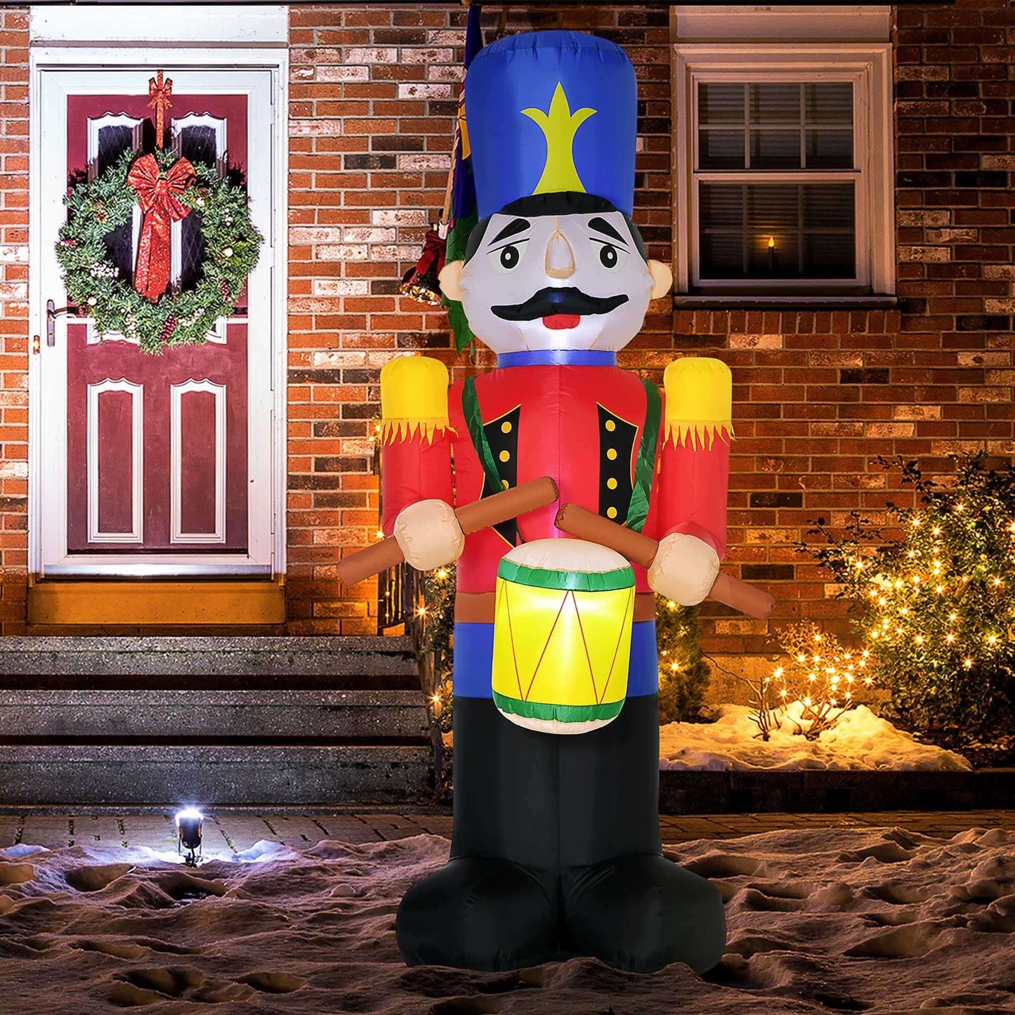 HOMCOM 8ft Christmas Inflatables Nutcracker with LED lights, outdoor holiday decoration in front of a festive house.