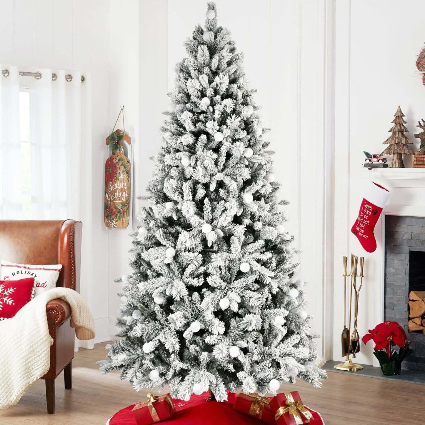Flocked Christmas Tree with Colorful Lights, 8ft tall, snow-flocked branches, in a cozy living room setting, festive holiday decor.