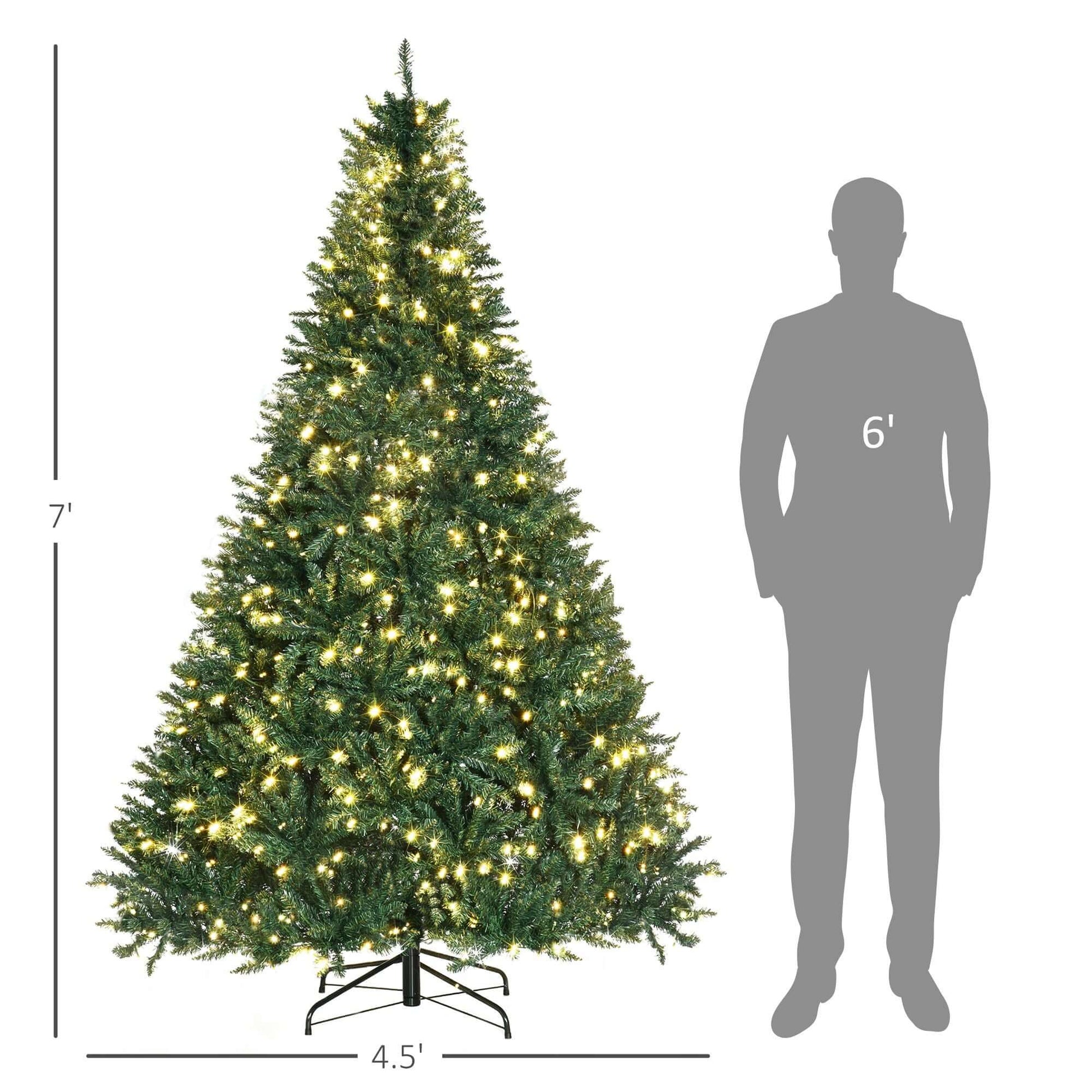 HOMCOM 7ft Pre Lit Douglas Fir Artificial Christmas Tree with warm white LED lights and realistic branches next to a person for scale.