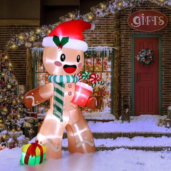 7.9ft Christmas Inflatable Decoration gingerbread man with LED lights in snowy yard