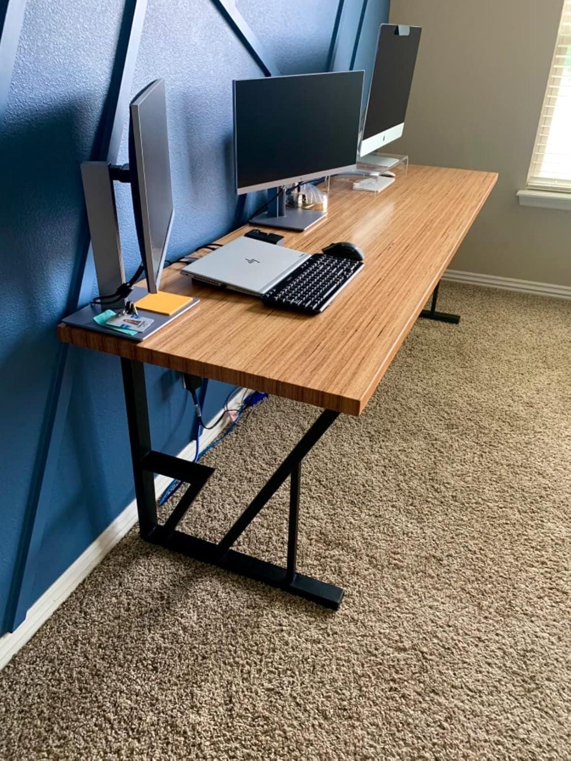 Modern desk setup with dual monitors using Black Iron Table Legs 28 Inches Industrial Strength for a sleek industrial look.