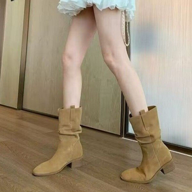 Autumn Western Pleated Short Cowhide Leather Boots for Women in stylish brown, showing pleated design and mid-heel on wood floor.