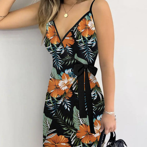Women's V-neck Lace Up Plant Print Off Shoulder Versatile Dress with floral design and bow detail, perfect for summertime.