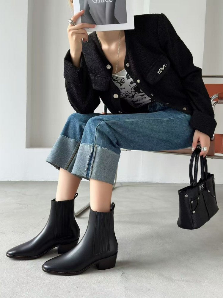 Model wearing Women’s Retro Square-Toe Mid-Heel Chunky Leather Boots