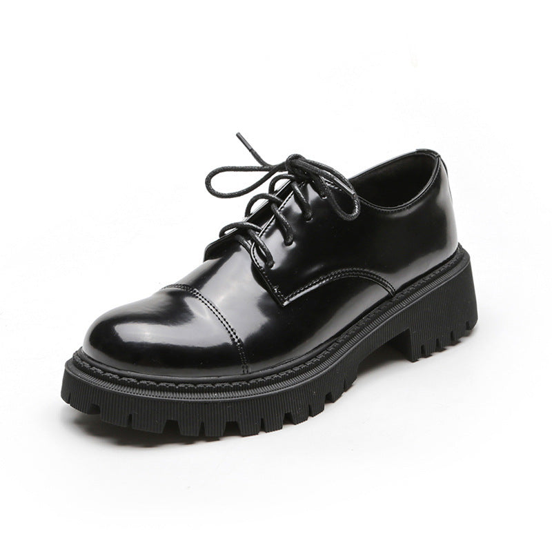 Women’s Solid-Color Retro Slip-On Platform Shoes with black glossy finish and elevated soles for chic styling.